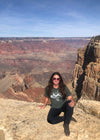 woman at the Grand Canyon wearing a green elk antler t shirt from River to Ridge Clothing