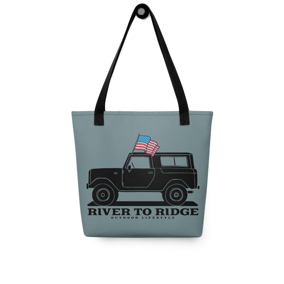 Vintage USA Logo Tote Bag in indigo blue from River to Ridge Clothing Brand. Features a drawing of a vintage bronco truck with an american USA flag