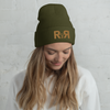 R2R Logo Unisex Beanie in Olive Green with the Mountain Logo from River to Ridge Clothing Brand - woman wearing it with blonde hair