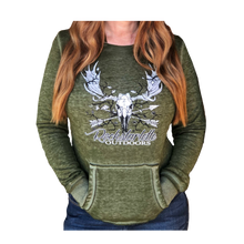  Vintage Wash Olive Hoodie on a woman with red hair and jeans featuring a moose skull with antlers and arrows and rockstarlette Outdoors