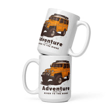  Adventure from the River to the Ridge Logo Coffee Mug with a landcruiser in yellow on it with big tires
