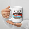 River to Ridge Brand Coffee Mug with a bush plane Alaskan logo on it on floats in a lake - backcountry taxi