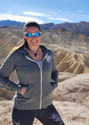 woman in death valley wearing a mountain goat zip up hoodie from river to ridge