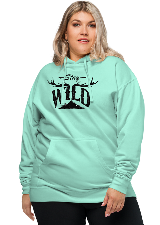 Plus Size woman in hoodie with stay wild logo in teal with antlers and mountains