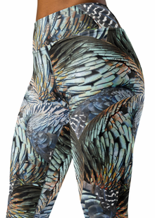  woman in leggings with turkey feather pattern