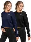 2 women in cropped sweatshirts in black and blue that have WILD elk antler logo on them