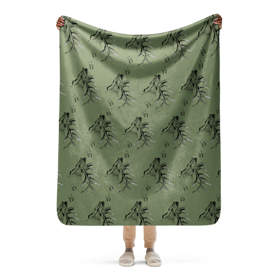 large sherpa fleece blanket from River to Ridge with elk all over it and also elk tracks, olive green