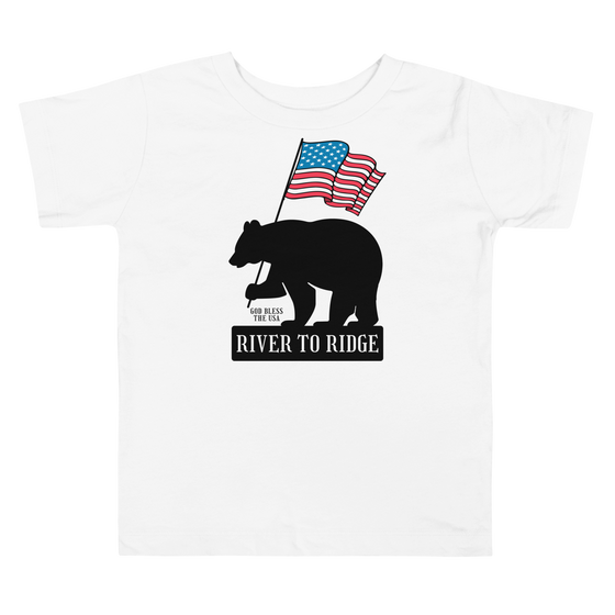 Patriotic Bear Logo from River to Ridge Brand on a toddler t shirt for kids in white. Features a black bear holding a USA flag
