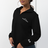Womens Half zip pullover from River to Ridge clothing brand with the logo on the left chest and sleeve. Woman wearing it in black