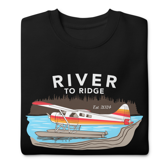 Backcountry Taxi, Bush Plane Logo Womens Pullover Sweatshirt from River to Ridge Clothing Brand with an Otter on floats on a lake in Alaska