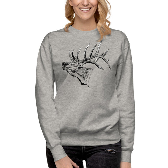 Woman in pullover with elk on it in grey from River to Ridge Apparel
