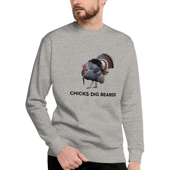 Man with a beard wearing a sweatshirt in grey that says Chicks Dig Beards and has a drawing of a gobbler turkey strutting with a long beard. from the brand River to Ridge