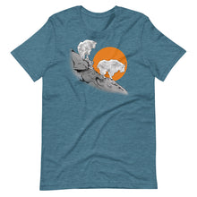  teal blue t shirt with 2 mountain goats standing on a ledge in the setting sun