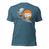 mens t shirt with mountain goats standing on a cliff with the sun setting in teal from River to Ridge Brand