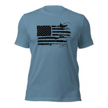  man wearing a sportsmans flag blue t shirt from River to Ridge Clothing Brand at the gym. shows a USA flag with the stripes replaced by kayak fishing for bass, antlers, goose hunting, fly fishing drawings