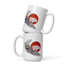  two coffee mugs stacked up with Mountain Goats on them standing on a mountain side
