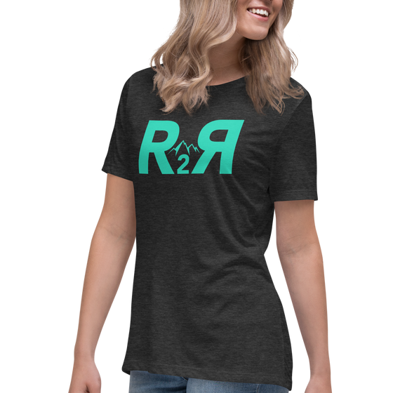 Womans T shirt from River to Ridge Brand in teal and charcoal heather with the R2R Logo on it with mountains and backwards R - woman with blonde hair wearing the T shirt