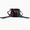 A product listing  for a cobalt blue concealed carry bag, showing the bag with long tassel straps on a white  background. 