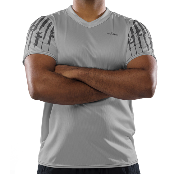 Product mockup of a man wearing a River to Ridge grey tactical range t shirt