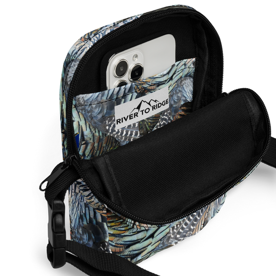 Crossbody concealed carry bag in Turkey Feather Pattern from River to Ridge Clothing Brand - photo shows internal pocket that fits an iphone