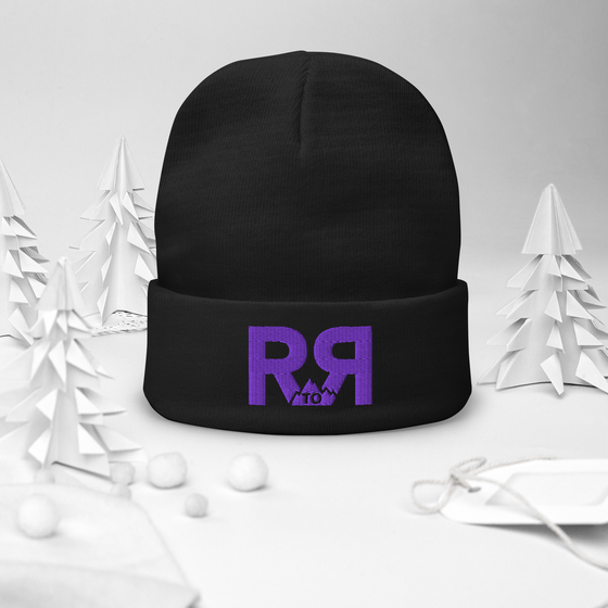 Product mockup of a River to Ridge Logo Beanie in black with purple stitching R to R