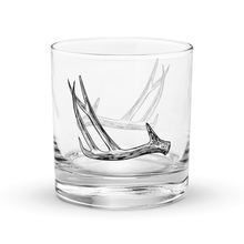  Product mockup of a whiskey rocks glass with deer antler shed hunting logo  on it from River to Ridge Brand