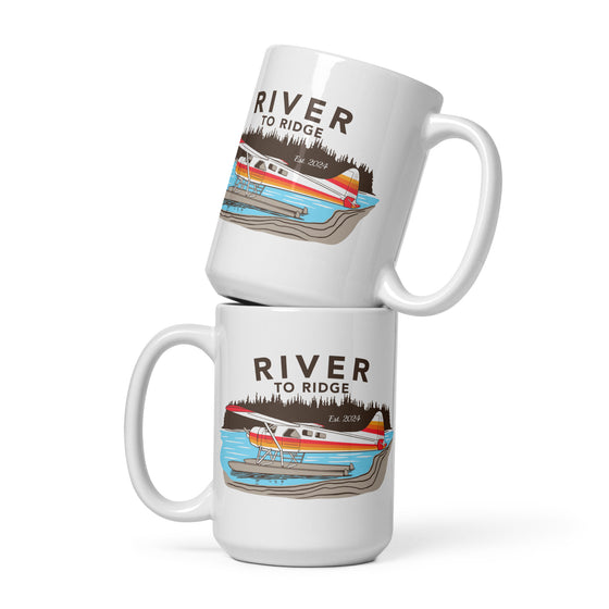 River to Ridge Brand Coffee Mugs stacked on top of each other with a bush plane Alaskan logo on it on floats in a lake - backcountry taxi