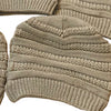 Knitted beige beanie and mittens set on a white background