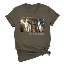  Brown t-shirt with a nature-themed christian camo cross graphic and text on a white background