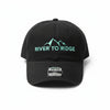 Black cap with 'River to Ridge' logo on a gravel surface