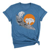 Blue t-shirt with a graphic of two mountain goats on a rock and an orange sun in the background