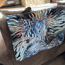  Turkey Feather Pattern Throw Blanket from River to Ridge Brand, on the couch