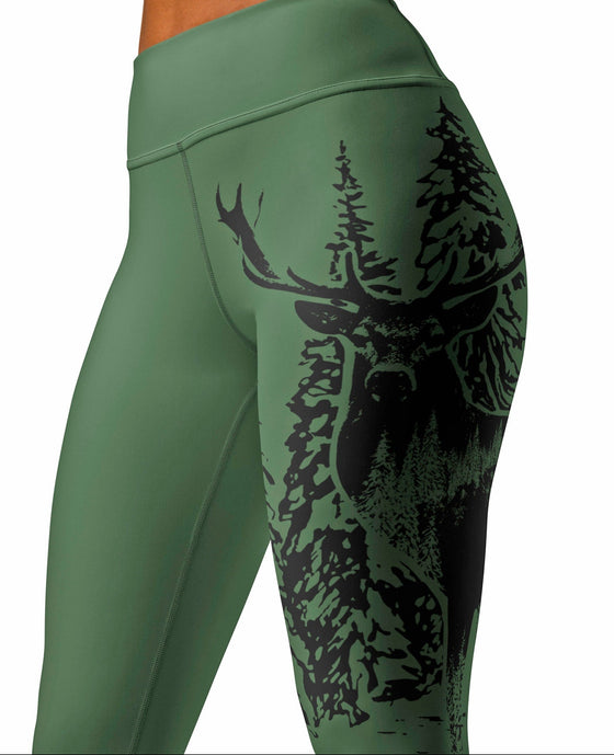 Green leggings with a deer design on a white background