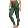 Green leggings with deer design worn by a person on a white background