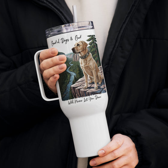 Product mockup of a River to Ridge brand Stainless Steel tumbler travel mug with a yellow lab on it and the words Good ol Dogs and God, will never let you down. Christian drinkware