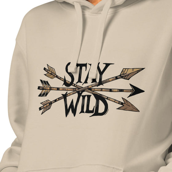 Product mockup of a River to Ridge Clothing Brand hoodie with the Stay Wild Archery Bowhunting Logo on it with traditional african arrows