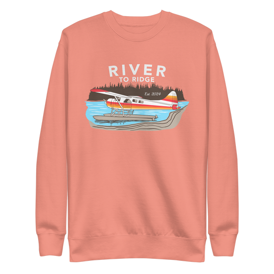 Backcountry Taxi, Bush Plane Logo Womens Pullover Sweatshirt from River to Ridge Clothing Brand with an Otter on floats on a lake in Alaska