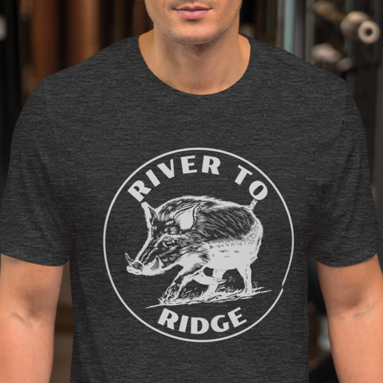 River to Ridge Brand Men's T shirt with a Hog Hunting Logo on it in white, worn by a man at the gym