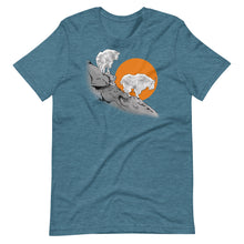  teal blue t shirt with 2 mountain goats standing on a ledge in the setting sun