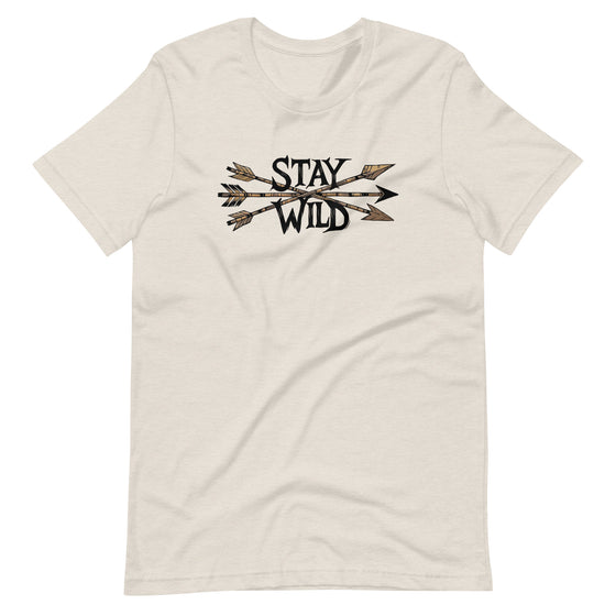Product mockup of a River to Ridge Clothing Brand T Shirt for Women with the Stay Wild Archery Bowhunting Logo on it with traditional african arrows