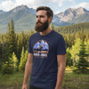 Person wearing a navy blue t-shirt with 'River to Ridge Clothing' graphic design on a white background