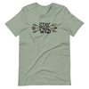 Product mockup of a River to Ridge Clothing Brand T Shirt for Women with the Stay Wild Archery Bowhunting Logo on it with traditional african arrows