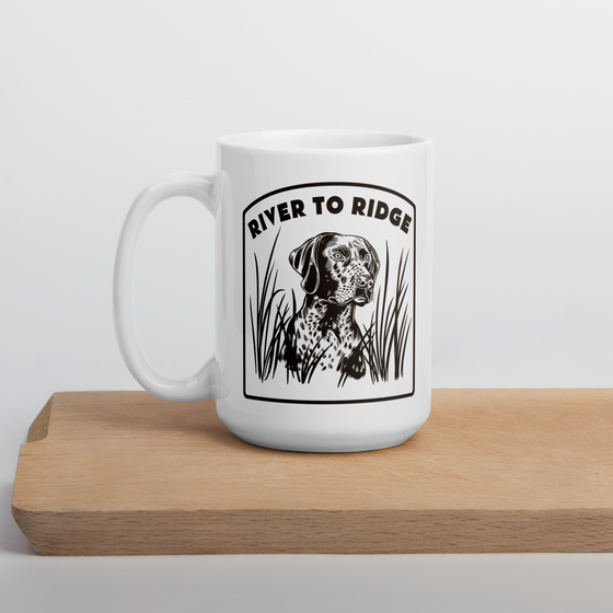 Product mockup of a Hunting Dog Waterfowl coffee mug from River to Ridge Clothing Brand in white and brown