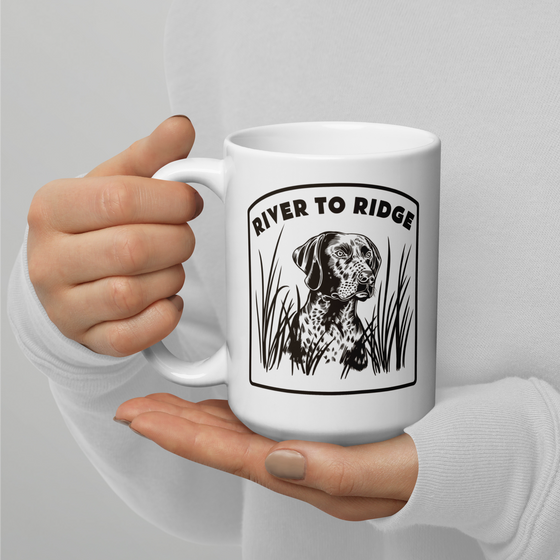 Product mockup of a Hunting Dog Waterfowl coffee mug from River to Ridge Clothing Brand in white and brown