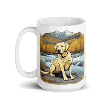  Product mockup of a River to Ridge Clothing Brand Yellow Lab Coffee Mug with a dog sitting by a river and mountains in the background