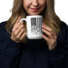 Woman holding a mug with an American flag design on a white background