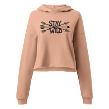  Product mockup of a River to Ridge cropped womens hoodie with the Stay Wild Archery Bowhunting Logo on it with traditional african arrows