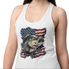 Woman wearing a white tank top with a fish and American flag design on a white background