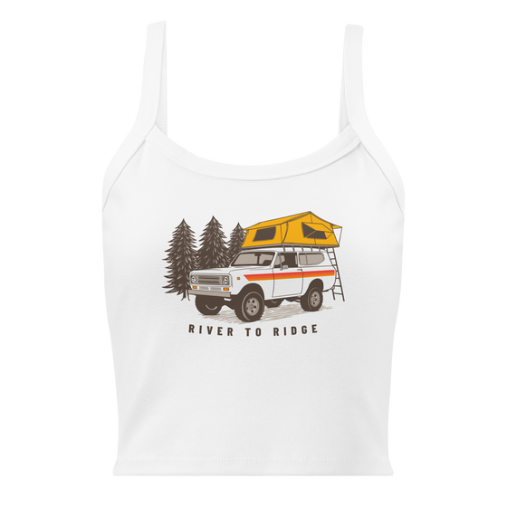 Vintage truck camping logo on a white tank top, International Scout with tent on top for offroading / overlanding adventures and pine trees on a womens top for River to Ridge Clothing Brand